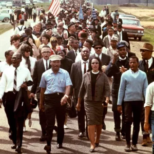 Dr. King and Mrs. King lead a 5-day march from Selma, AL to the state capitol in Montgomery, AL from March 21-25 1965